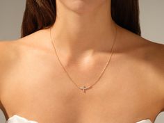 Shine with luxurious style with this 14k gold Sideways Cross necklace. The pendant is perfect for any occasion, from a special night out to an everyday staple. FEATURES • Made to Order • Gold Kt: 14k Solid Gold, 18k Solid Gold • Gold Color: Rose Gold, Yellow Gold, White Gold • Available Length Range: 14 Inches - 20 Inches (Custom lengths are also available upon contact) • Available Gemstone: Diamond, Moissanite • Diamond Cut: Round • Diamond Color - Clarity: G Color - SI1 Clarity • Number of Sto Cross Necklace Sideways, Band Necklace, Mens Bracelet Silver, Mens Silver Necklace, Silver Wedding Bands, Diamond Cross Pendants, Diamond Cross, Birthstone Earring, Round Moissanite