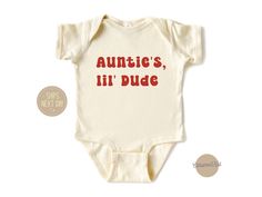 Let your nephew show off his adorable style with our "Auntie's Lil' Dude" Shirt! Made from soft, breathable fabric to keep him comfortable all day long. Features a charming design and playful slogan that celebrates the special bond between auntie and nephew. Perfect for family gatherings, playdates, or everyday wear. Available in a variety of sizes to suit boys of different ages, ensuring the perfect fit. Treat your little guy to this cute and cozy shirt that will make him feel extra special! Ha Auntie Shirts For Nephews, Nephew Onesie, Auntie And Nephew, Aunt Things, Aunt And Nephew, Auntie Baby Clothes, Bug Board, Nephew Shirts, Aunt Onesie