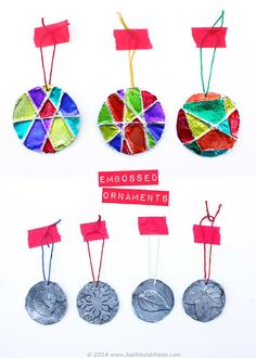 four different types of coins with red tags attached to them, each one has an ornament on it