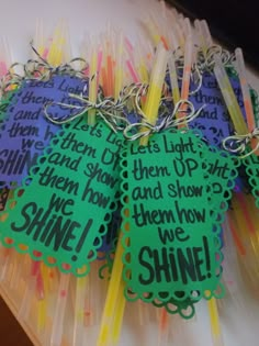 there are some tags that say shine, let's light and then show them how we shine