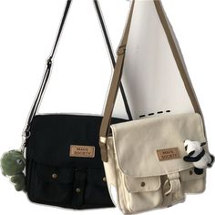 Casual School Crossbody Laptop Bag, Large Capacity Canvas Student Bags, Casual Crossbody Laptop Bag For School, Large Capacity Canvas Bags For Students, Black Crossbody Bag For School, Black Crossbody Bag For Students, Trendy Shoulder Bag For Students, Black Satchel Bag For Students, Casual Beige Shoulder Bag For Students