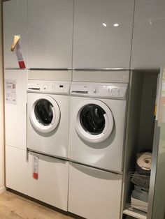 a washer and dryer in a small room