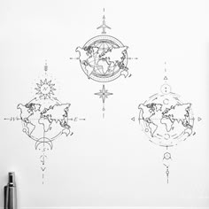 a drawing of the world on a whiteboard with pen and marker next to it