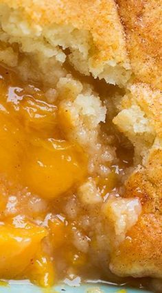 a close up of food on a plate with some sort of bread and sauce in it