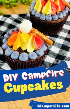 two cupcakes on a checkered table cloth with the words diy campfire cupcakes