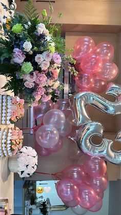 balloons, flowers and other decorations are on display