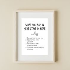 a white framed poster with the words what you say in here stays in here on it