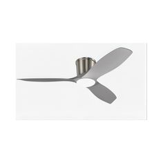 a ceiling fan that is on top of a white wall with a silver cup underneath it