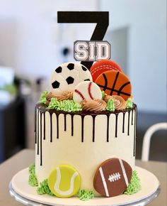 Balls for a Sports Themed Cake. Buttercream Finish, Fondant Accents Sports Cakes For Boys Birthdays Kids, All Sports Theme Cake, Diy Sports Birthday Cake, Birthday Party Sports Theme, Sport Theme Desserts, Sports Theme Bday Party, Sports Theme Birthday Decor, Sports Birthday Decor, All Sports Themed Birthday Party Ideas