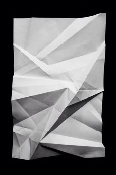 black and white photograph of an abstract paper design that looks like something out of space