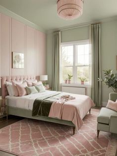 a pink and green bedroom with a bed, chair, window, rug and chandelier