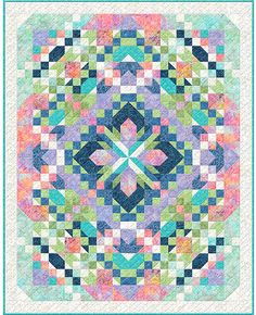 a colorful quilt with an intricate design on the front and side, in pastel colors