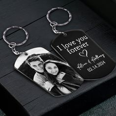 a couple's keychain with an engraved photo on it and the words i love you forever