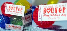 some colorful beads are on display for someone to put in their valentine's day card