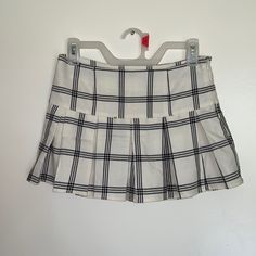 Super Cute Summer Black/White Plaid Skirt! Never Worn! There’s Shorts Underneath The Skirt~ White High Waist Y2k Mini Skirt, Y2k Style White Bottoms Short Length, Y2k Style White Short Bottoms, Y2k Style White Short Length Bottoms, White Cotton Skirted Skort, Y2k White Mini Skirt For Spring, Y2k Style White Mini Skirt For Spring, White Trendy Mini Tennis Skirt, White Casual Shorts For School