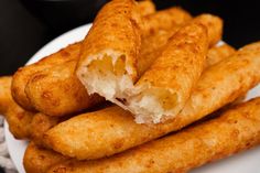 some fried food is on a white plate