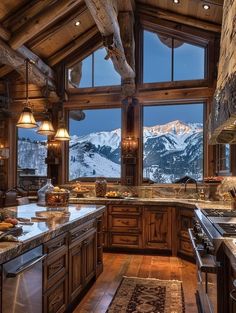 a large kitchen with wooden cabinets and granite counter tops in front of a mountain view