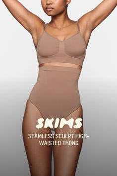 Wear this perfectly stretchy, shapewear high-waisted thong for a flat tummy and cinched waist without bulk or panty lines. Features a high waist fit that hits right below the bust, an interior silicone underband to prevent roll-down, a cotton gusset, and a wide crotch for added coverage. Fits true to size. | SKIMS High-Waisted Thong | Medium Neutral | 2XL | Seamless Sculpt Flat Tummy, Cinched Waist, Shapewear, High Waist, Lounge Wear, High Waisted, How To Wear