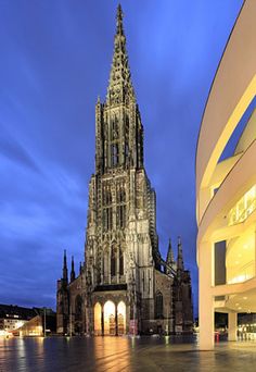 the cathedral is lit up at night time