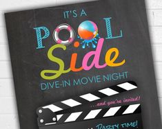 a chalkboard sign that says it's a pool side dive in movie night