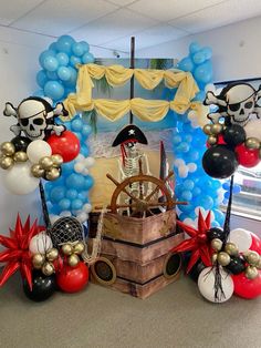 a pirate themed party with balloons and decorations