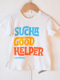 Every toddler parent has used the phrase "Sucha Good Helper," and now there's a t-shirt for that! Encourage your little helper to get involved with this super soft cotton tee available in sizes 2T - Youth Small! Quick shipping and 15% off your first order. Toddler Graphic Tee, Grafic Tees, Eco Kids, Helping Hand, Kids Graphic Tees, You Know It, Inspiration For Kids, Soft Ring, Hand Illustration