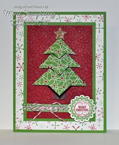 a card with a christmas tree on it