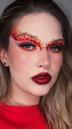 White And Red Makeup Look, Ramp Look Makeup, Fire Goddess Makeup, Valintens Makeup Looks, Dramatic Red Eye Makeup, Ladybug Makeup Women, Bird Inspired Makeup, Fire Makeup Halloween, Orange Fairy Makeup