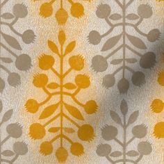 an orange and grey floral pattern on fabric