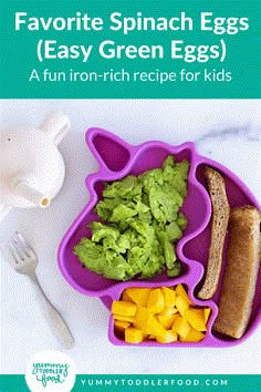 a purple plate topped with food next to a fork and knife on top of a white table