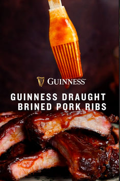 guinness draught brined pork ribs on a plate with the words guinness draught brined pork ribs