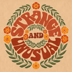 an orange and green wreath with the words strange and unusual