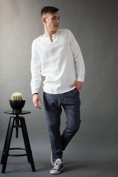 "Our V-neck linen shirts offer a regular casual fit that looks the part all year round. Whether you're heading out for a meal, meeting up with friends, or you just want to look your best, nothing compares to the effortless fit of a handmade made to measure buttonless shirt. DETAILS: - OEKO-TEX certified product (Sustainable Textile) - Your new flex - Overhead design - Vneck collar - Rounded hem - Long sleeves - Regular fit Length from the lower to the upper seam 75 cm / 29,5\". If You prefer sho Linen Clothes For Men, Mens Linen Shirts Casual, White Linen Shirt Men, Trousers Outfit Men, Mens Linen Outfits, Wedding Shirt, Mens Dress Shirts, Short Kurta, White Linen Shirt