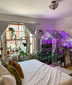 a bedroom with lots of plants in it