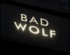 a neon sign that says bad wolf on it