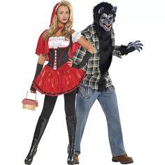 two people dressed up in costumes and one is holding a handbag while the other holds a purse