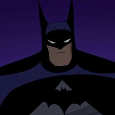 batman in the dark knight animated movie with his caped head and hands on his chest