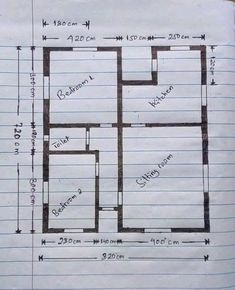 a drawing of a floor plan on top of a piece of paper with lines drawn across it