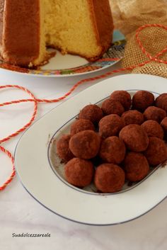 there is a plate with some cake balls on it next to a bundt cake