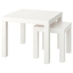 two white tables sitting next to each other on a white background with no one in it