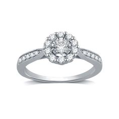 This stunning bridal ring from the Forever Bride collection is the ultimate in timeless elegance. Crafted in sterling silver, the engagement ring is artfully designed to feature miracle plate diamond solitaire flanked by a swooping line of channel-set diamonds on either side. The wedding band is simple and stylish with a set of channel-set diamonds across the top. The set has a total diamond weight of 5/8 carats. Every piece of Walmart jewelry, including this Forever Bride piece, passes rigorous Bride Collection, Walmart Jewelry, Artfully Designed, Channel Set, Bridal Ring, Bride Bridal, Bridal Rings, Diamond Solitaire, Solitaire Ring