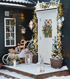 a house decorated for christmas with lights and decorations