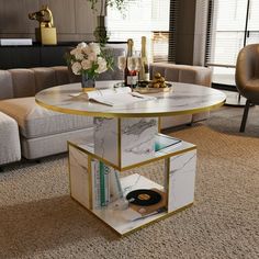 a living room filled with furniture and a table topped with a record on top of it