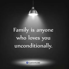 a light that is on top of a black background with the words family is anyone who loves you unconditionalallyly