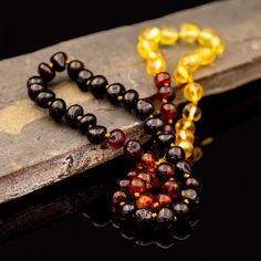 This Necklace Is 19.7" (50cm) The Bead Sizes Are Between 7.5mm And 8.5mm Our Amber Jewelry Comes From Lithuania And Is 100% Handmade. Therefore Two Pieces Of Jewelry Won’t Be Identical. They Are Authentic And Unique In Color, Shape, And Size. Amber Helps People Of All Ages Due To Its 100% Natural Form. It Is Non-Toxic As Well As Non-Invasive While Not Accumulating In The Tissue. We Have 3 Sizes Available 15.7" (40cm) 17.7" (45cm) 19.7" (50cm) Free People Necklace, Turquoise Bar Necklace, Baltic Amber Necklace, Braided Necklace, Long Silver Necklace, Stacked Necklaces, Amber Necklace, Boho Pendant, Beaded Statement Necklace