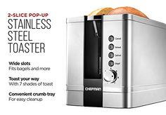 a toaster with two slices of bread in it and the words, 2 slice pop - up stainless steel toaster