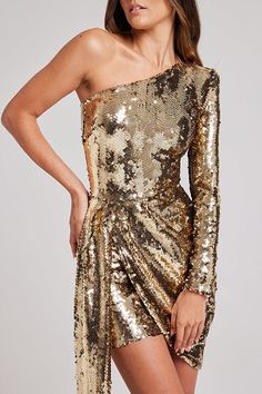 Details
	Size Chart



	
	
		
		
			
			
				Perfect for party season and sure to add sparkle to your wardrobe. Featuring a structured one-shoulder design and an asymmetrical floor-length drop, this dress is crafted from liquid gold sequins in a dramatic silhouette for an unparalleled party look.  Our distinctive clothing will add instant style to your wardrobe..
				 
				
					Length: Thigh-Length
					Material: Sequins
					Sleeve Type: One Sleeve
					Neckline: One Shoulder
					Hidden zipper
					Style: Party Wear
					Fit Style: Regular Fit
				
				
				@Note:
				Size: please check measurements carefully
				Please allow 0.5-1" difference due to manual measurement
				Different monitor settings means colors may differ slightly
				1" = 2.54cm
				@ Strapless Playsuit, Nadine Merabi, Sequin Short Dress, Mini Gold Dress, Outfits Dress, Sequin Sleeve, Fresh Outfits, Beautiful Figure, Party Look