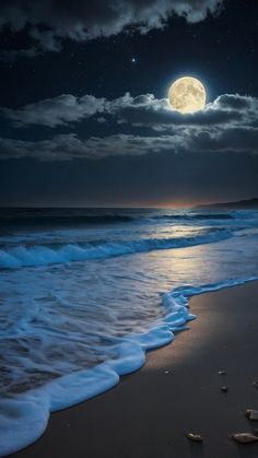 a full moon is seen over the ocean with waves crashing on the beach and stars in the sky