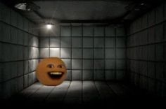 an orange is in the middle of a dimly lit room with its mouth open and eyes wide open