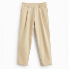 Zara Carrot Fit Pants In Beige Size 29 Nwt Carrot-Cut Trousers With A Pleat At The Front. With Front Pockets, Back Welt Pockets And A Zip Fly And Top Button. 100% Cotton Zip Fly Button Closure 2 Back Pocket 2 Front Side Pockets Belt Loops Inseam 27.5” 6861/317/710 Items Are Retail Store Purchases And May Have Been Handled Or Tried On By Store Customers Prior To Sending, Photos Are Taken Of Item With A Zip Tag Attached To Represent The Item Purchased Zara Cotton Tapered Leg Pants, Zara Tapered Leg Cotton Pants, Zara Tapered Leg Pants With Welt Pockets, Beige High-waisted Chinos With Pockets, Zara Casual Straight Chinos, Casual Straight Chinos By Zara, Casual Zara Straight Chinos, Zara Casual Straight Leg Dress Pants, Zara Casual Straight Dress Pants